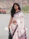 Light Pink Satin Saree with Flowers, Line Design & Stylish Pallu – Timeless Grace 