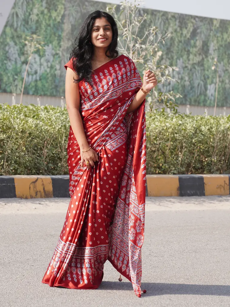 Elegant Red Satin Silk Saree with Designer Prints & Handmade Tassels – Timeless Elegance (Unstitched, No)