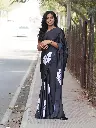 Elegant Black Satin Saree with White Floral Design – Timeless & Graceful